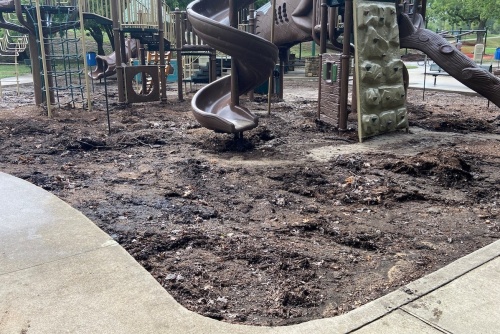 muddy area under playground equipment