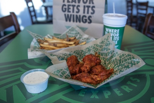 A Richardson Wingstop, located at 900 N. Coit Road, Ste. 2700, is planning to undergo renovations to become a take-out only restaurant. (Courtesy Wikimedia Commons)