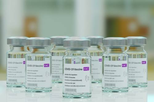 Vials of the COVID-19 vaccine on a flat surface