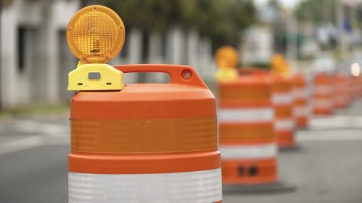 construction barrels in a row