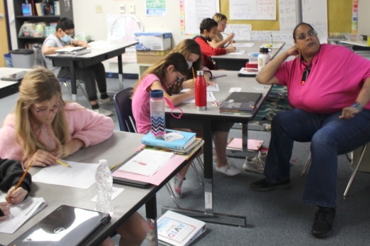 Teacher and students.