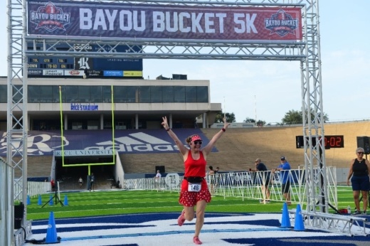 Runners compete with Rice University or the University of Houston in the Karbach Brewing Co. Bayou Bucket in 5K or 10K races. (Courtesy Houston Running Co.)