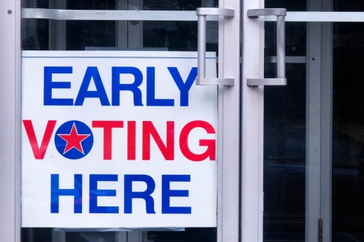 sign that says early voting here 