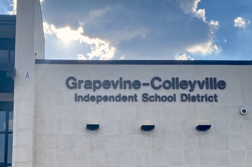 building with sign reading "Grapevine-Colleyville Independent School District"