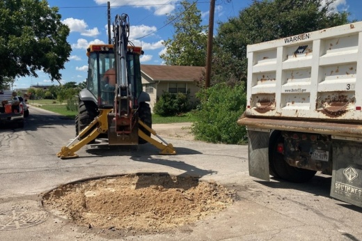 Photo of construction vehicles at an intersection in Old Town