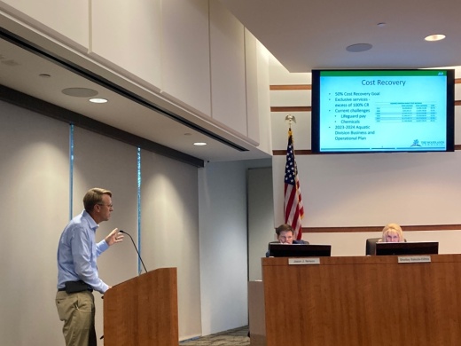 John McGowan, director of parks and recreation for The Woodlands Township, discusses costs associated with heating Lakeside Pool at a Sept. 28 meeting. (Vanessa Holt/Community Impact)