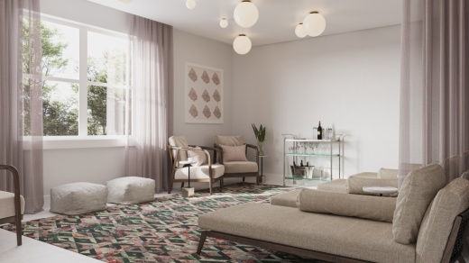 Lounge room in a hotel with couches.