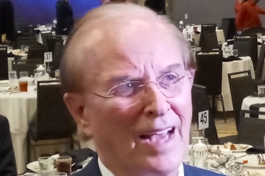 Outgoing Bexar County Judge Nelson Wolff addresses reporters following his final State of the County speech with the San Antonio Chamber of Commerce on Oct. 12 at Grand Hyatt San Antonio River Walk. (Edmond Ortiz/Community Impact)