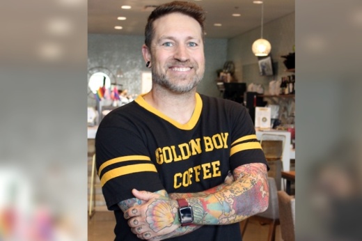 man standing with arms crossed