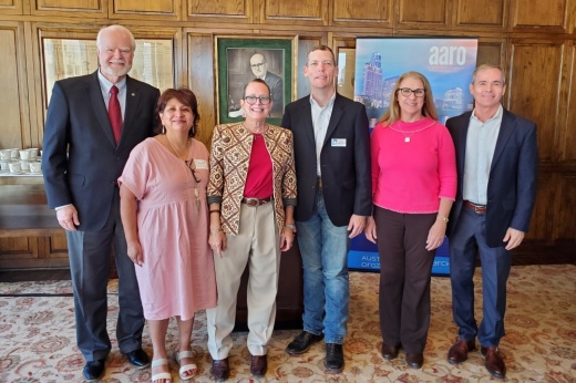 From left: Bastrop County Judge Paul Pape; Lydia Perez, Community Action Inc.; Susan Dawson, chair of the AARO Health Committee, co-chair of Addressing Cancer Together; Hays County Commissioner Walt Smith; Williamson County Commissioner Cynthia Long; and David Smith, CEO United Way for Greater Austin, announced the commitment of funds Oct. 19. (Courtesy AARO)