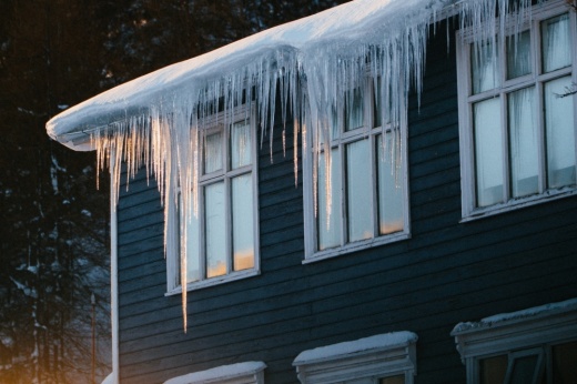 Dark grey house with icicles