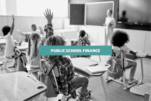 The words 'public school finance' overlayed on an image of students in a classroom