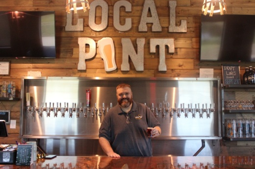 Local Pint co-owners Phillip Coleman (pictured) and Anna Borland Sage celebrate the restaurants fifth anniversary on Oct. 13. (Michael Crouchley/Community Impact)