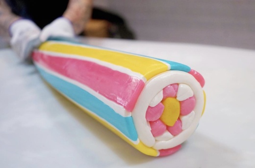 The shop is known for its store design, which allows customers to view the candy-making process, including the addition of color and the shaping, pulling and cutting of the candy. (Courtesy Papabubble)