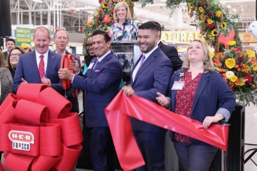 Photo of a large ribbon being cut