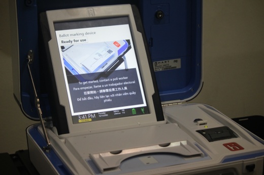 This is a picture of a ballot marking device with a screen that reads "ready for use".