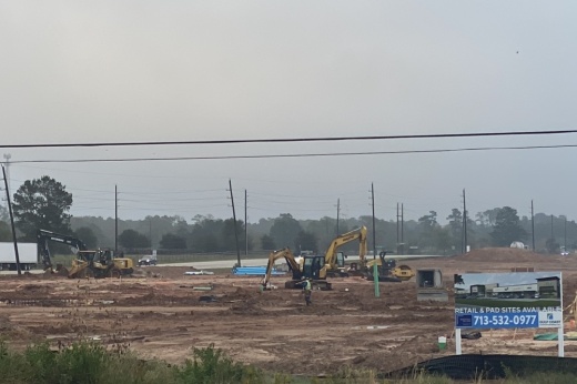The Magnolia Village development is in the works across from the Magnolia Place H-E-B. (Lizzy Spangler/Community Impact)