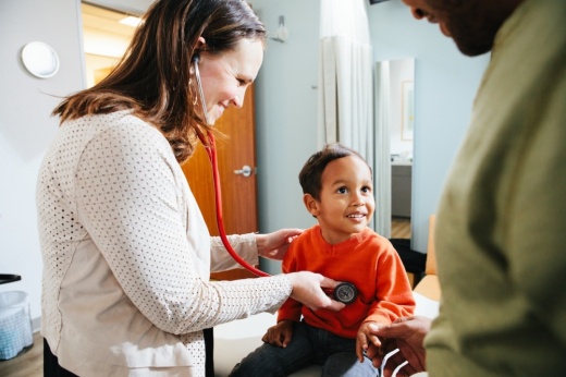 boy being examined by doctor