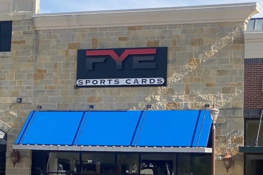 exterior of store with blue awning