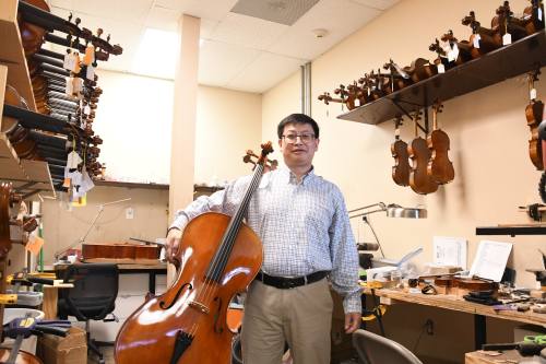 Frank Li has owned Katy Violin Shop for the last eight years. (Photos by Hunter Marrow/Community Impact)