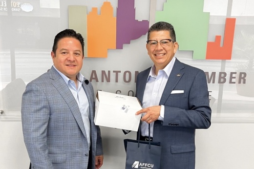 Richard Perez (right), San Antonio Chamber of Commerce president and CEO, stands with Stephen Ynostrosa,  Air Force Federal Credit Union executive. Perez announced Nov. 17 his plan to end his 15-year tenure as chamber leader Dec. 31. (Courtesy San Antonio Chamber of Commerce)