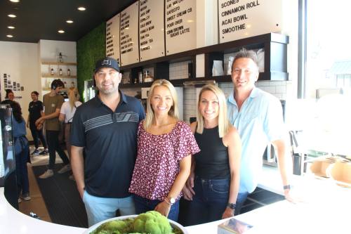 From left: Jeremy and Sarah Gonske and Candace and Wes Lambard opened Luv Coffee in March 2021. Luv Coffee’s menu includes a breve latte. (Peyton MacKenzie/Community Impact)
