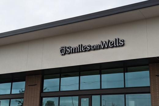 Photo of the sign at Smiles on Wells