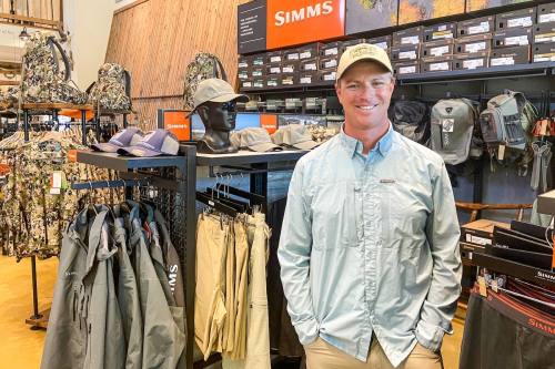 business owner in fly fishing shop