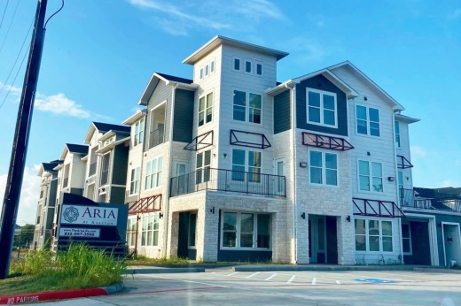 The 178-unit community features one-, two- and three-bedroom apartments with microwaves, storage space, and washer and dryer connections. (Courtesy Graywood Properties) 