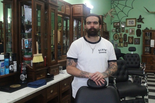 Slava Barbershop in Georgetown offers classic men's haircuts, beard trims, hot towel shaves and craft cocktails. (Grant Crawford/Community Impact)
