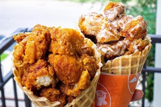 Fried chicken is in a waffle cone 