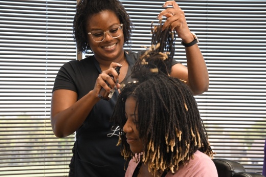 Loc'd N Studios helps maintain loc hairstyles, and offers other services. (Photos by Hunter Marrow/Community Impact)