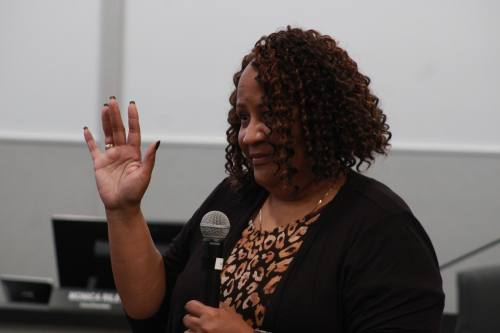 Missouri City's newest city manager, Angel Jones, takes the oath of office at a swearing-in ceremony during the Dec. 5 City Council meeting. (Jack Dowling/Community Impact)
