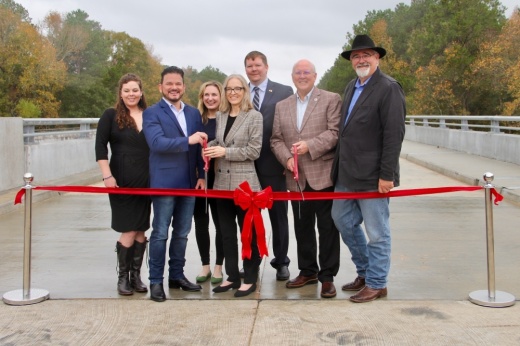 Harris County and Montgomery County officials were on hand for a dedication and ribbon-cutting ceremony to celebrate the opening of the Gosling Memorial Bridge on Dec. 6. (Wesley Gardner/Community Impact)