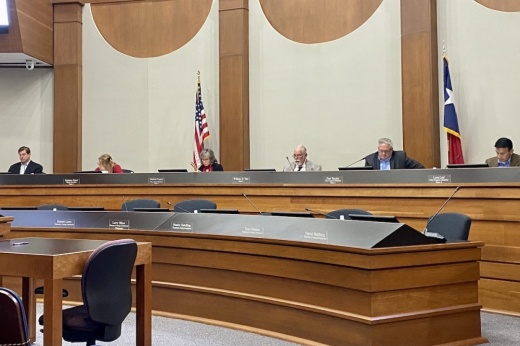 council members sit behind a dais