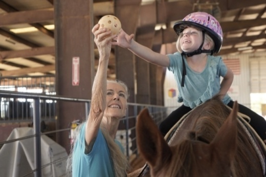 At Ride On Center for Kids, volunteers can assist riders or take care of horses. (Courtesy Ride On Center for Kids)