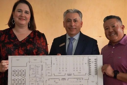 From left, Kelli Rhodes, Restore Education co-founder, president and CEO; Ventura Perez, Bank of America San Antonio president; and Restore Education Board Chair Ric Benitez present a rendering of the San Antonio nonprofit's planned East Side satellite location. Bank of America on Dec. 14 presented Restore Education with a prestigious Neighborhood Builder award of $200,000 to help launch the agency's expansion campaign. (Courtesy Restore Education)