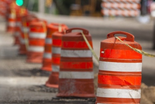 orange construction road barrels