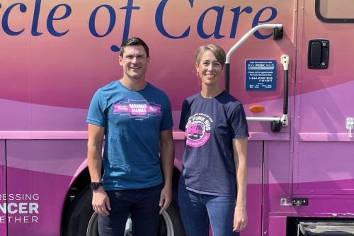 The Big Pink Bus is supported by Lone Star Circle of Care CEO Jon Calvin and Program Director Rebecca Sorensen. (Taylor Cripe/Community Impact Newspaper)