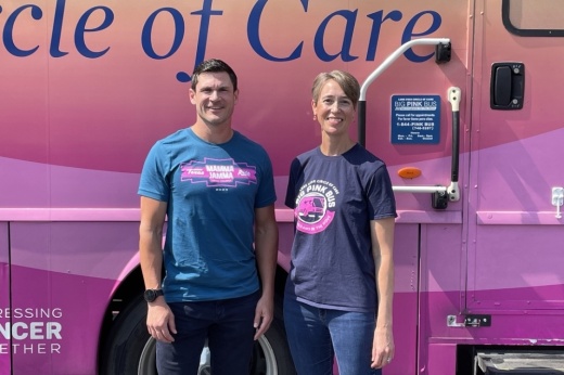 The Big Pink Bus is supported by Lone Star Circle of Care CEO Jon Calvin and Program Director Rebecca Sorensen. (Taylor Cripe/Community Impact Newspaper)