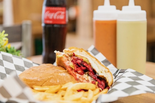 Tortas are served with beans, mayonnaise, lettuce, tomatoes, cheese, avocado and a choice of meat. (Courtesy Tacos El Gordo)