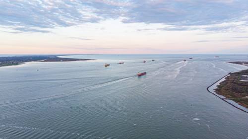 Ships sail off the Gulf Coast by Galveston. Project 11 would expand the Houston Ship Channel and allow for safer two-way transit of vessels throughout. (Courtesy Jamaal Ellis/J.Vince Photography)