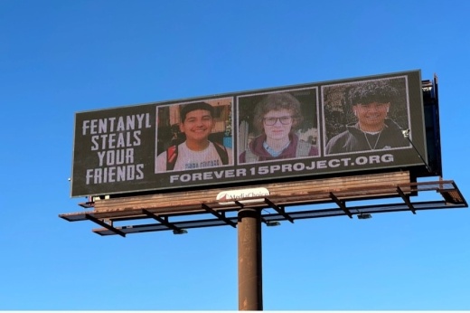 A billboard in Kyle features (from left) Noah Rodriguez, Kevin McConville and Garrett Garcia, all victims of fentanyl overdoses. (Courtesy Janel Rodriguez)