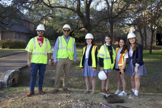 Members of the Sunset Valley Teen Commission and Google Fiber representatives visit the construction site in the Meadows neighborhood. (Elle Bent/Community Impact)
