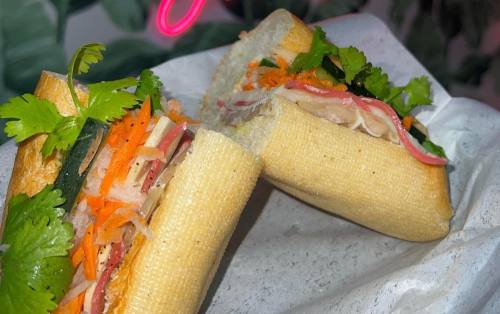 The restaurant serves its namesake, banh mi, which is a Vietnamese sandwich comprising a baguette, butter, pate, pickled cucumber, cilantro, green pepper, carrots, daikon and the patron's choice of protein. (Courtesy Banh Mi Eatery HTX)