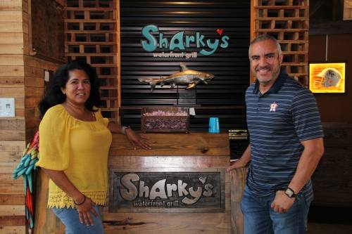 Local restaurateurs Rosa and Ronald Perez purchased J. Christopher's Pizza-Pasta on Dec. 1, after they were approached by the previous owners who were planning to close the eatery Dec. 31. The couple also own Sharky's Waterfront Grill and Chimichurri's South American Grill in King's Harbor Waterfront Village as well as Sharky's American Grill in Vintage Park. (Wesley Gardner/Community Impact)
