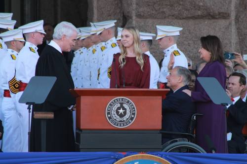 Gov. Greg Abbott takes the oath of office next to his wife, Cecilia, and daughter, Audrey.