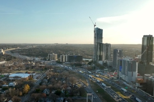Aerial view of a city with major highway