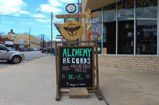 Alchemy Records and Atypical Apothecary sign. (Amira Van Leeuwen/Community Impact)