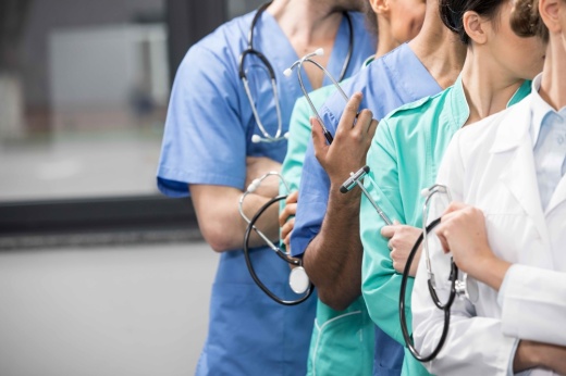 Healthcare workers lined up.